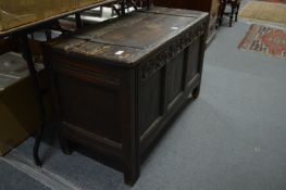An 18th century oak coffer.