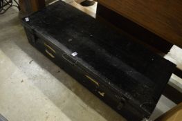 A tin trunk.
