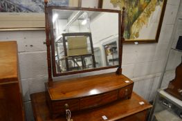 A good George III mahogany bow fronted dressing table mirror.