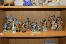 A quantity of bird ornaments.