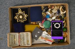 A box of costume jewellery.