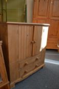 A pine TV cabinet.