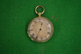 A gilt metal pocket watch.