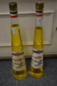 Two bottles of Galliano.