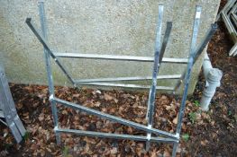 A folding sawing horse.