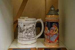 A cricketing tankard and a beer stein.