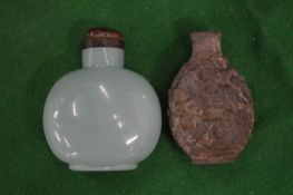 Two snuff bottles.