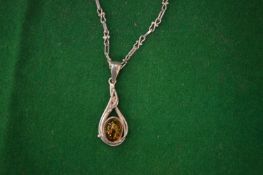 Silver pendant and chain.