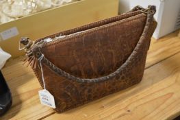 A crocodile handbag.