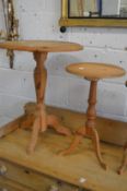Two pine tripod tables.
