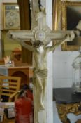 A carved alabaster crucifix.