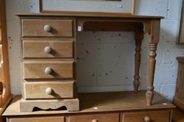 A pine single pedestal desk or dressing table.