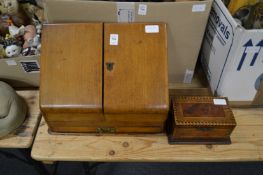 An Edwardian oak table top stationery casket together with a small box.