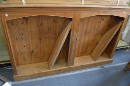A large pine bookcase.