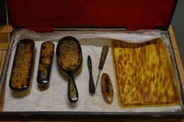 A tortoiseshell back dressing table items etc.