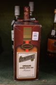 A one litre bottle of Cointreau, boxed, bottle of Southern Comfort, one litre and one standard