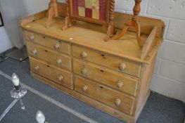A pine six drawer chest.