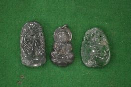 Three small Chinese carved jade amulets.