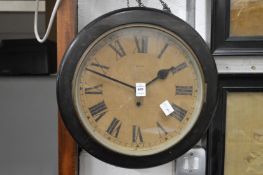 A circular wall clock.