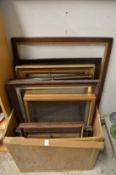 A quantity of picture frames.