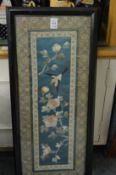 A Chinese embroidered picture, framed and glazed.