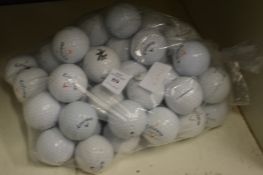 A bag of Callaway golf balls.