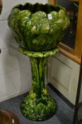 An Ault Oceana green glazed jardiniere and stand.