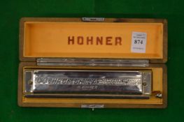 A Hohner accordion, boxed.