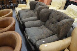 Large pair of late Victorian button upholstered wing armchairs.