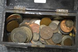 A quantity of pre-decimal and other coinage in a small lacquer box.