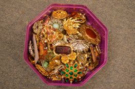 A large quantity of costume jewellery brooches.