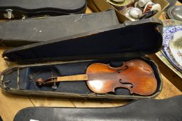 A cased violin (for restoration).