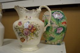 A decorative jug and a vase.
