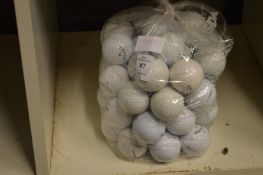 A bag of Callaway golf balls.