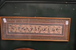 Two Chinese embroidered panels, framed and glazed.