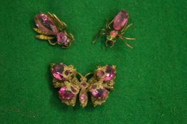 Decorative bug jewellery.
