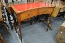 A Bevan Funell Reprodux mahogany two drawer concave fronted side table.