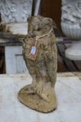 A garden ornament modelled as an owl.