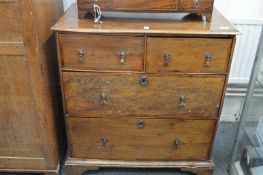 A 18th century mahogany small chest of two short over two long drawers.
