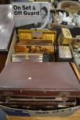 A small briefcase, wooden boxes etc.