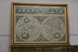 A large framed and glazed map of the world.