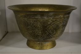 A Chinese engraved brass bowl.