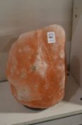 A large rock salt lamp.