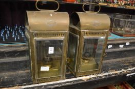 A pair of brass lanterns.