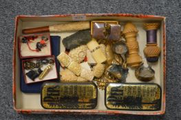 A small box of decorative items and collectables.