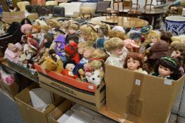 A large group of collectors dolls.