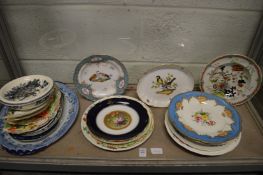 A collection of decorative plates and dishes.