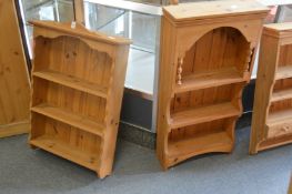 Two pine shelving units.