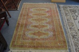 A cream ground Indian rug 176cm x 117cm.