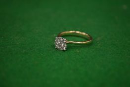 A golden diamond ring.